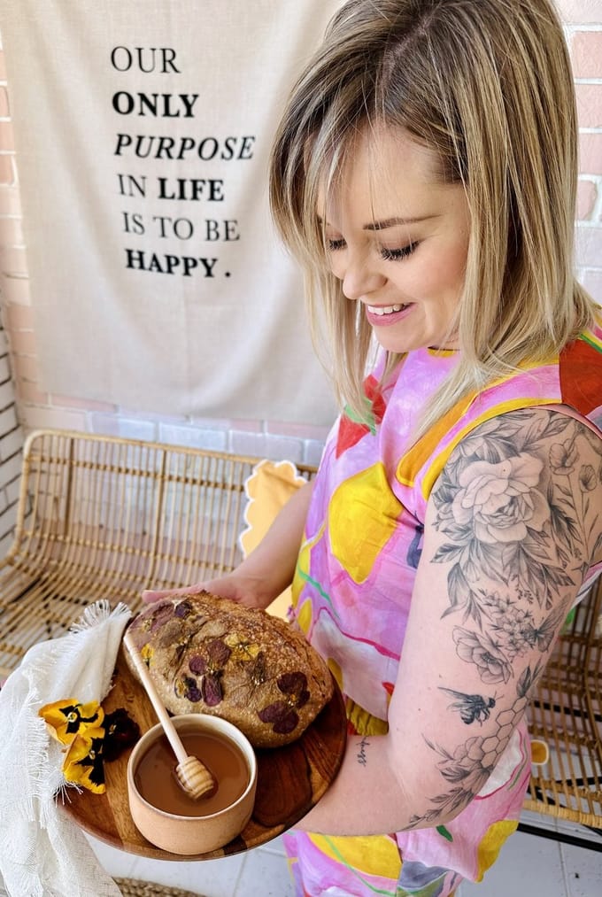 Janet holding an oat and honey boule
